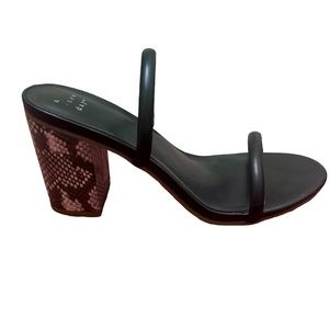 A New Day, black strappy heels